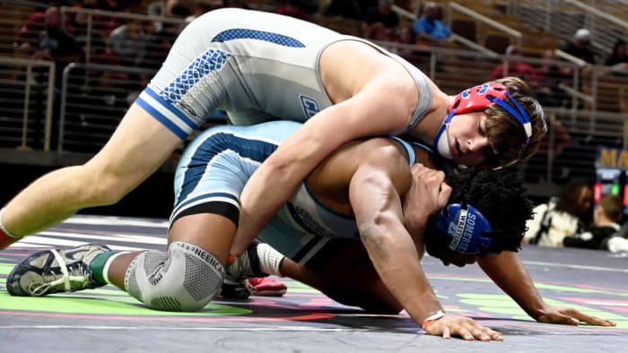 Logan Fowler from Cleveland wins the 165-pound title match against Kendrick Hodge from Somerset Academy, 5-1, on Saturday at the Knockout Christmas Classic at Silver Spurs Arena in Kissimmee.
